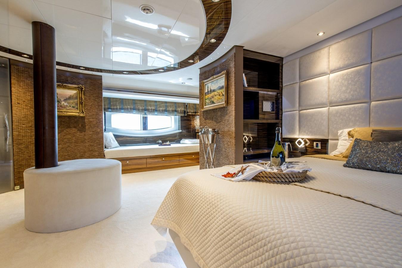 a bedroom with a large bed aboard TIAMAT Yacht for Sale