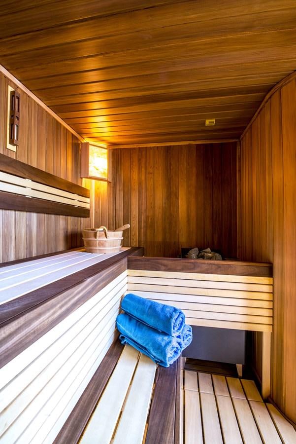 a wood room with a wood floor and a wood wall aboard TIAMAT Yacht for Sale