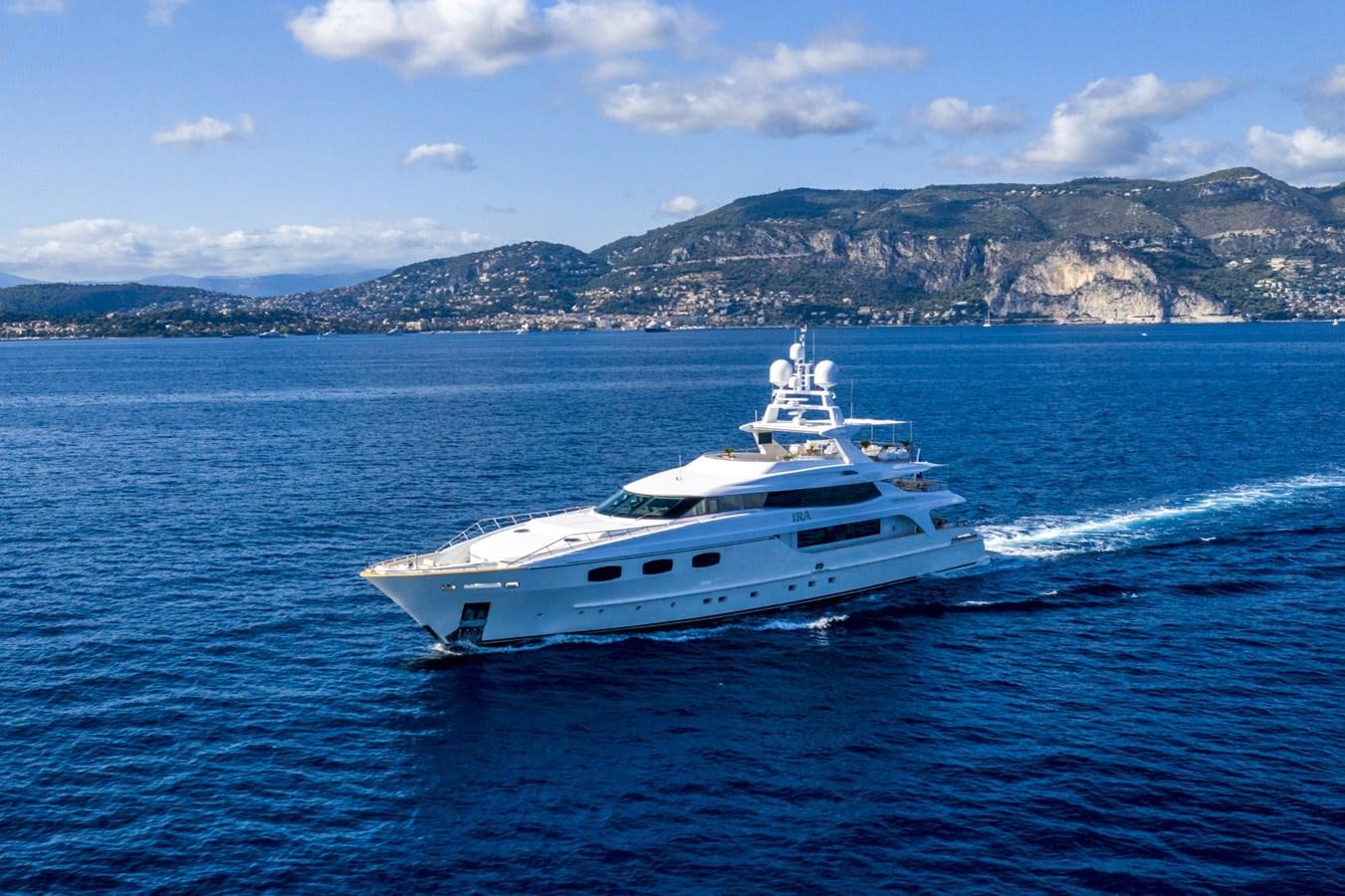 a white yacht on the water aboard TIAMAT Yacht for Sale
