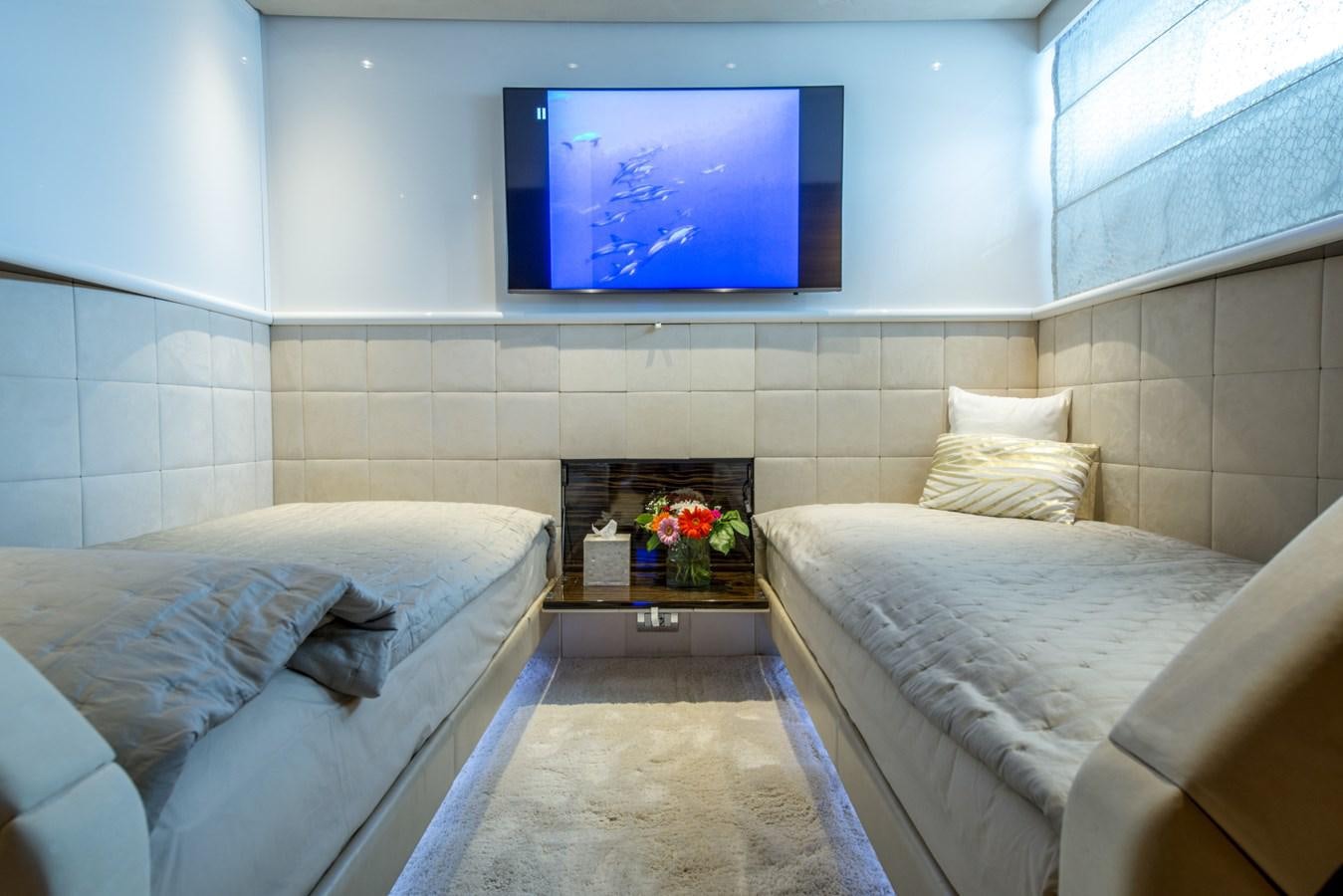 a room with two beds aboard TIAMAT Yacht for Sale