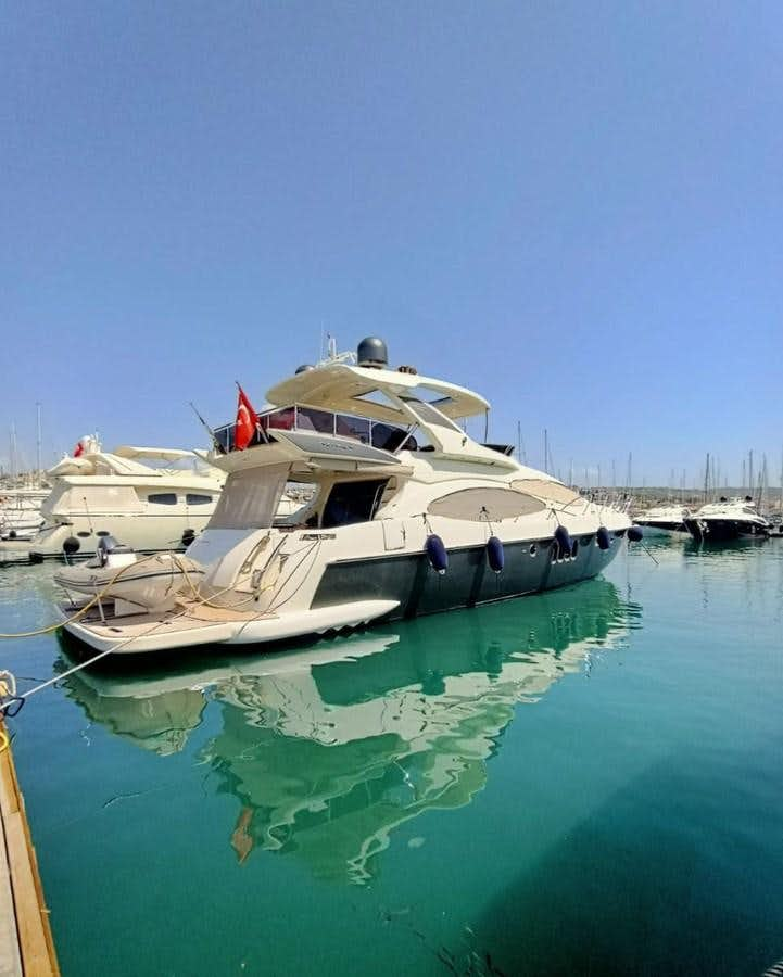 a boat is parked in the water aboard AZIMUT 100/32 Yacht for Sale