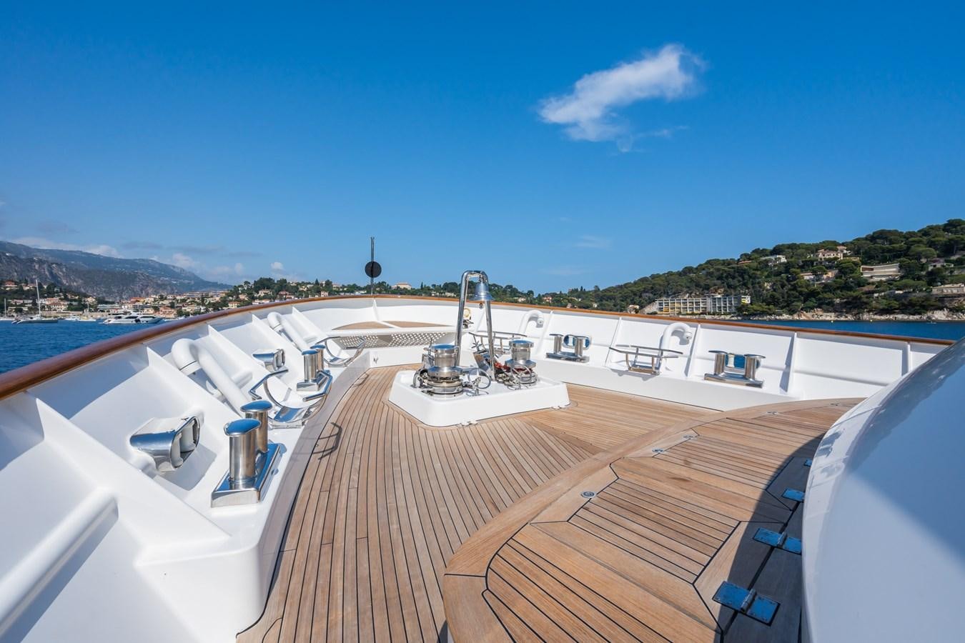 a deck with a deck and a large ship on it aboard CORNELIA Yacht for Sale