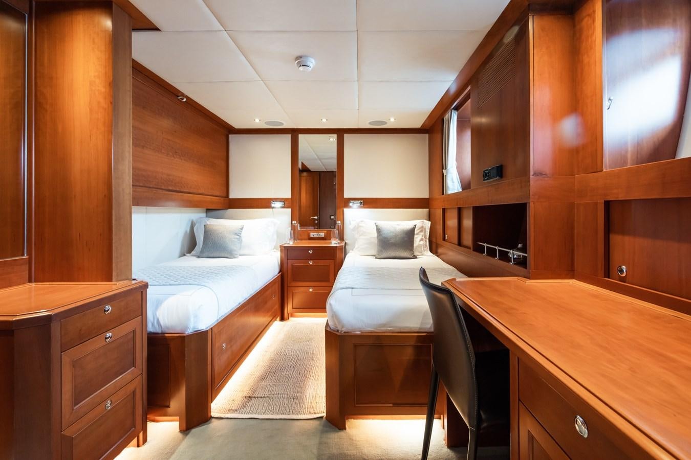 a room with two beds aboard CORNELIA Yacht for Sale