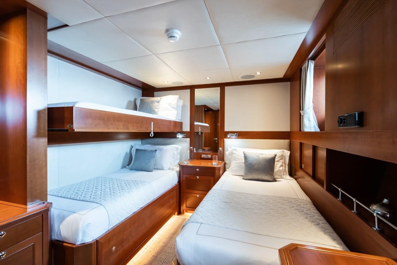 a room with two beds aboard CORNELIA Yacht for Sale
