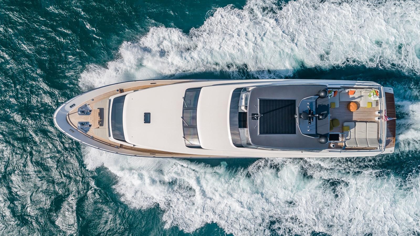 a helicopter above the ocean aboard XWAVE Yacht for Sale