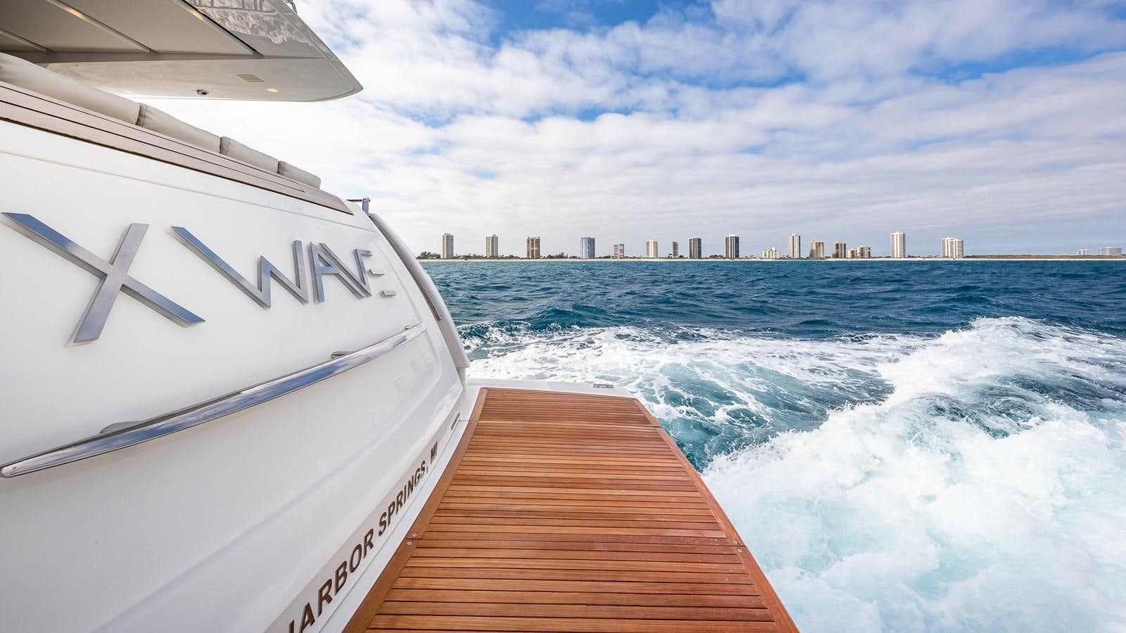 a boat on the water aboard XWAVE Yacht for Sale