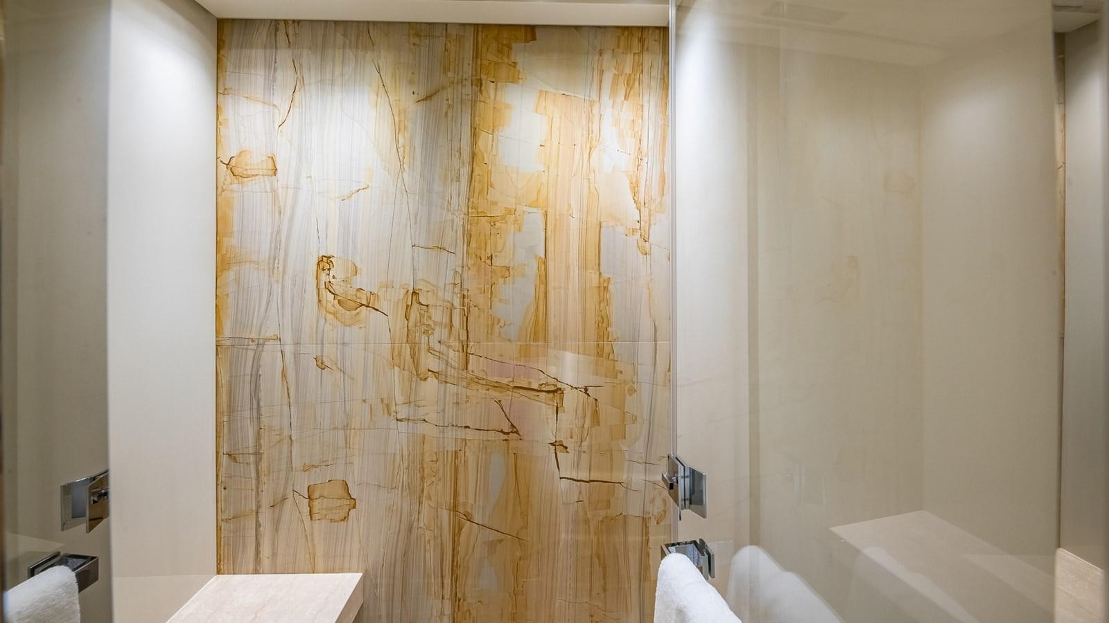 a wall with a curtain and a window aboard XWAVE Yacht for Sale