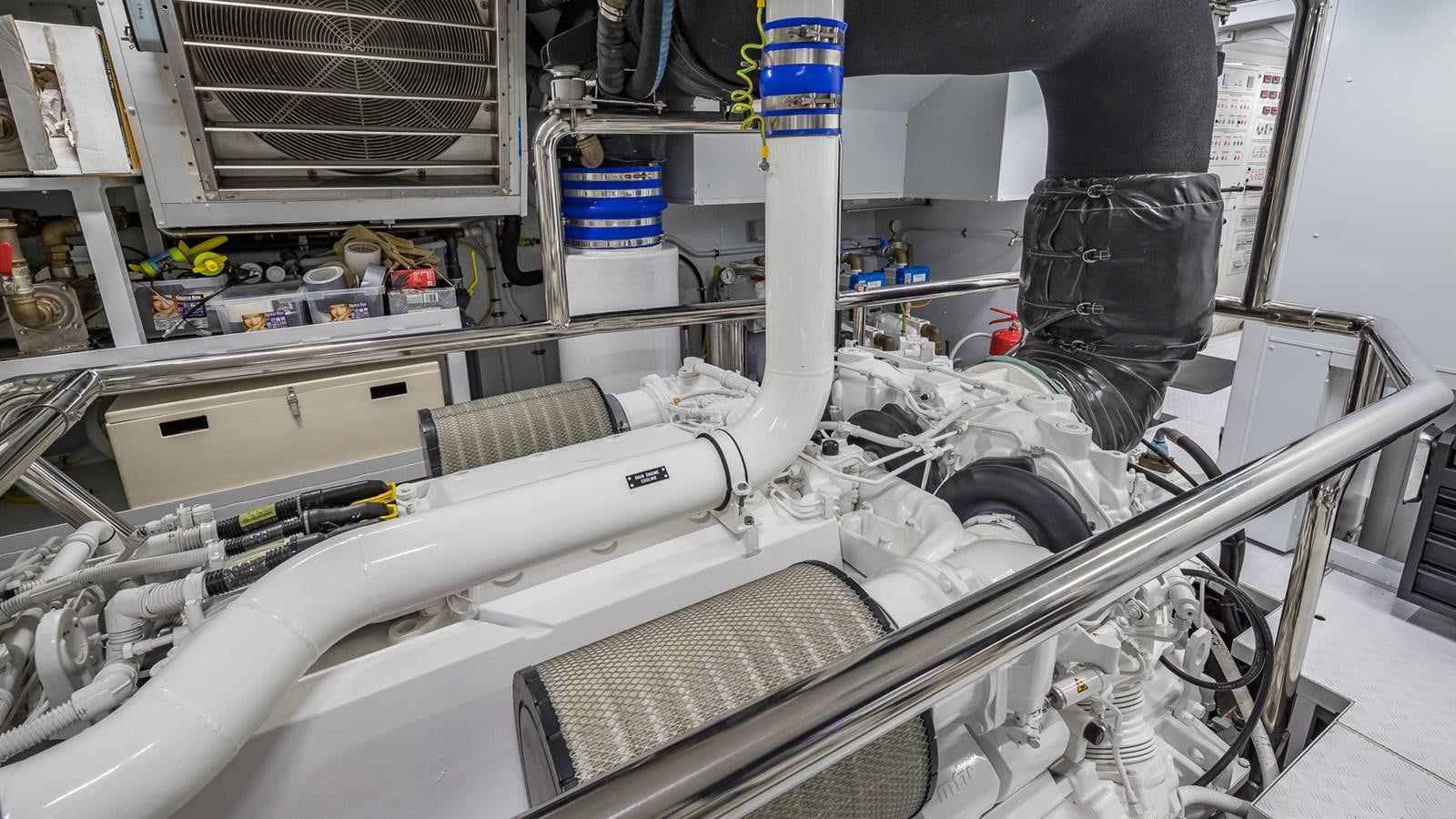 a person's legs and feet in a factory aboard XWAVE Yacht for Sale