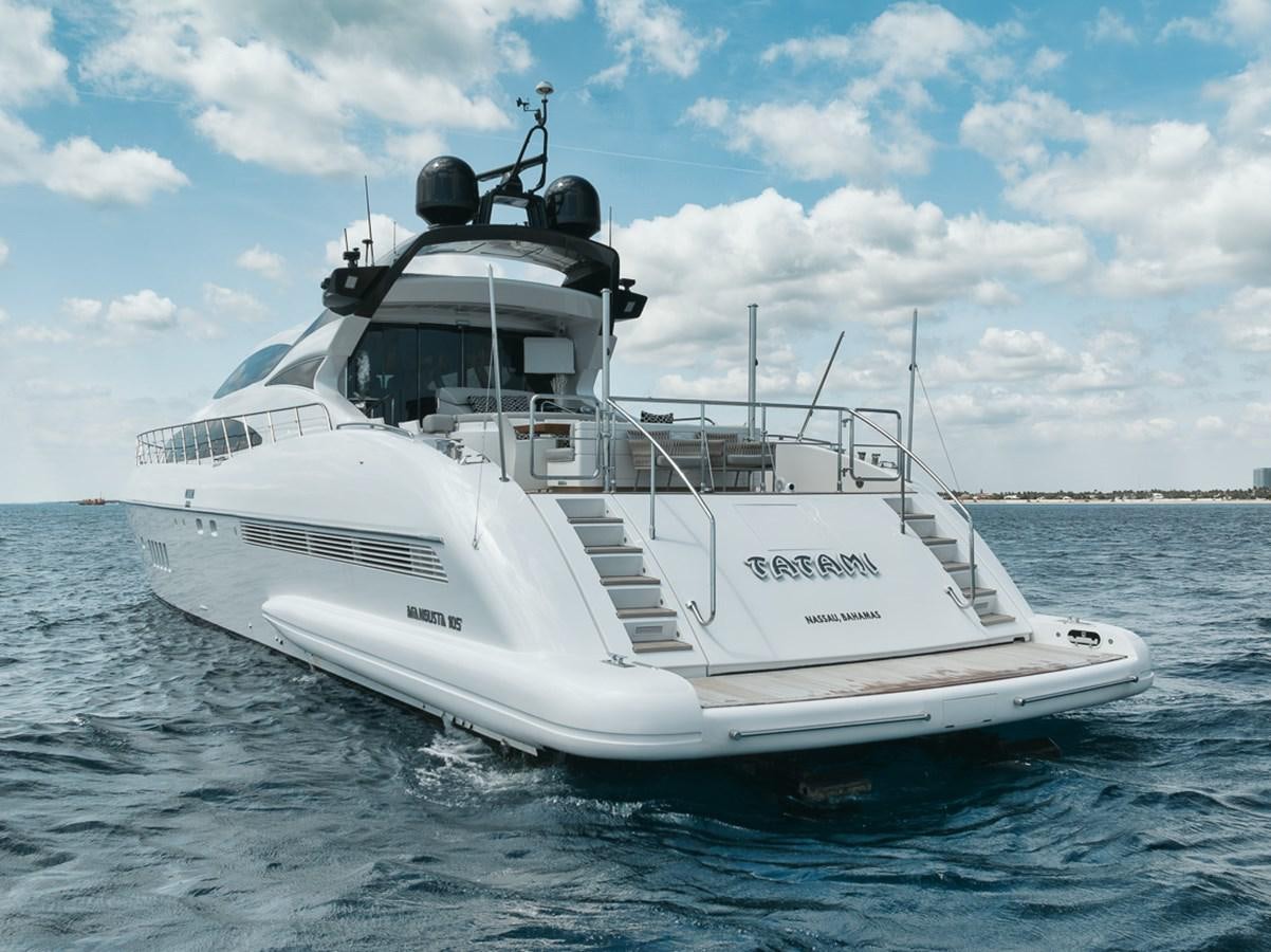 a white boat in the water aboard TATAMI Yacht for Sale