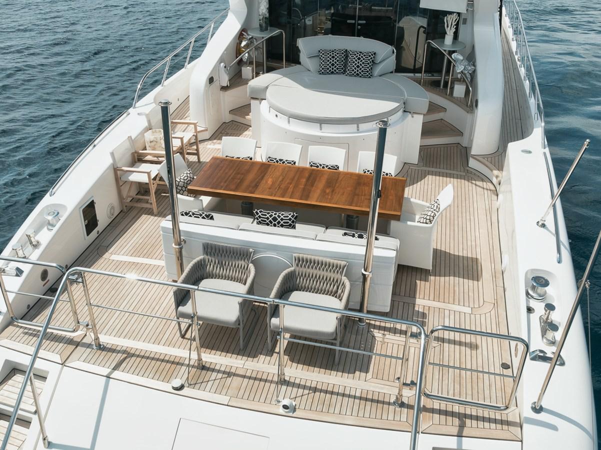 a boat with chairs on the deck aboard TATAMI Yacht for Sale