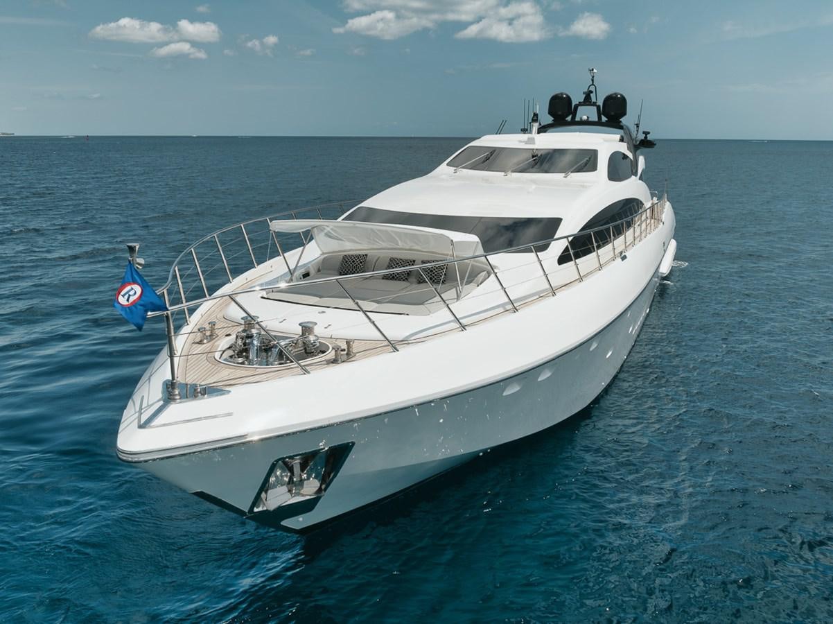 a white yacht in the water aboard TATAMI Yacht for Sale