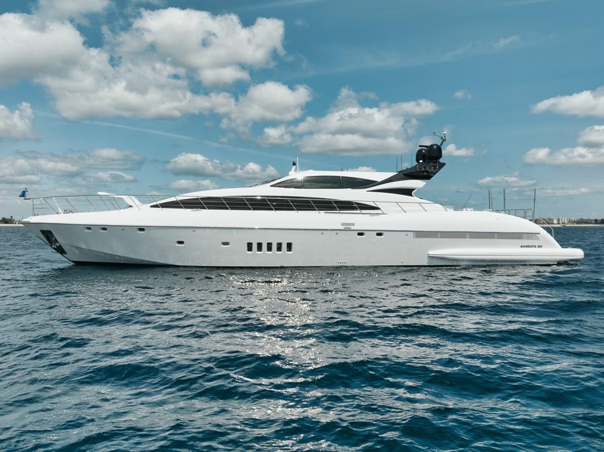 a white yacht in the water aboard TATAMI Yacht for Sale