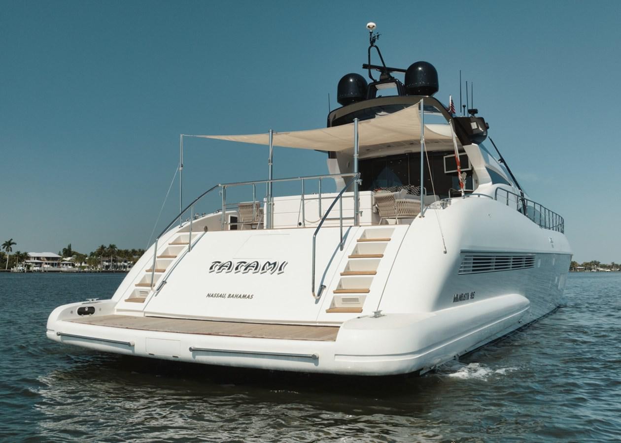 a white yacht on the water aboard TATAMI Yacht for Sale