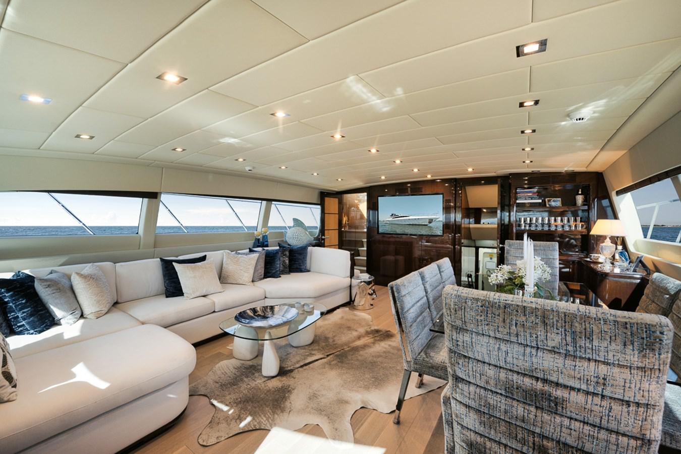 a living room with a large window aboard TATAMI Yacht for Sale