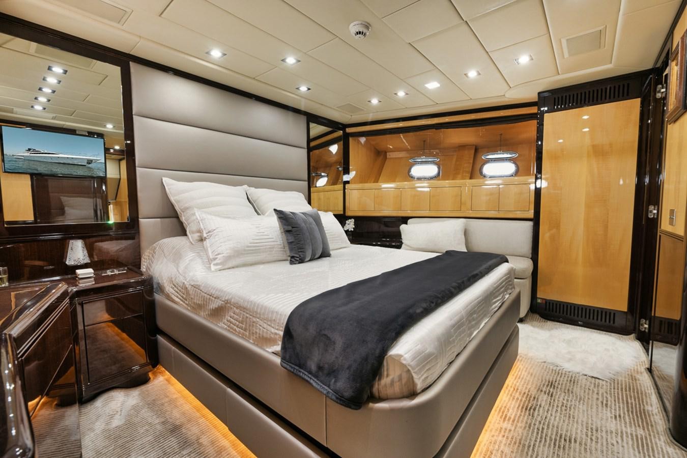 a bed in a room aboard TATAMI Yacht for Sale