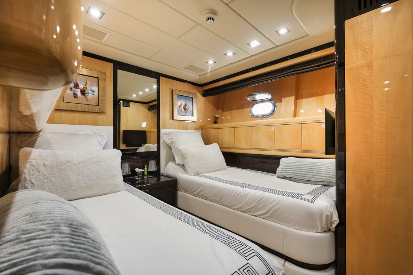 a room with two beds aboard TATAMI Yacht for Sale