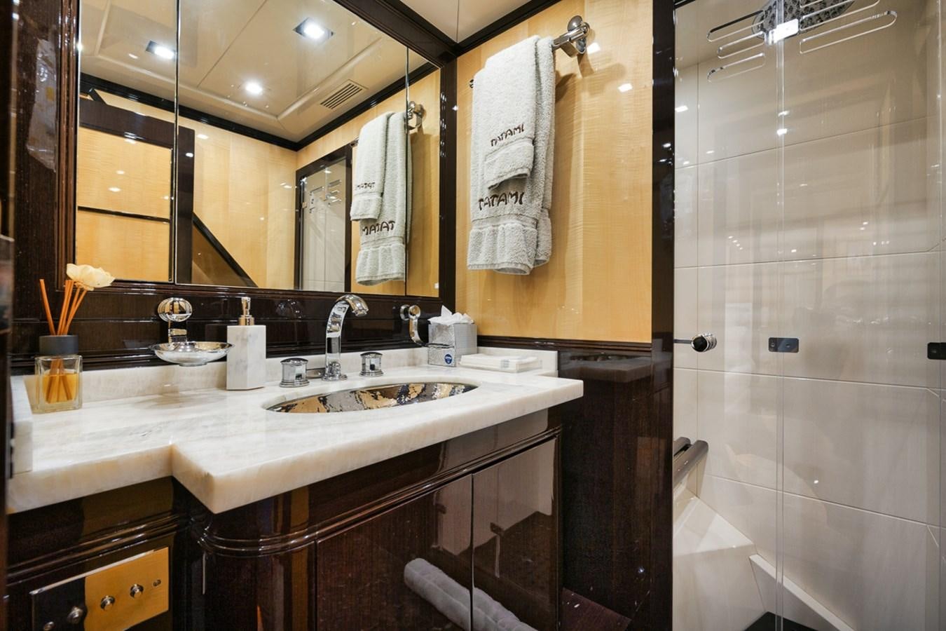 a bathroom with a sink and a shower aboard TATAMI Yacht for Sale