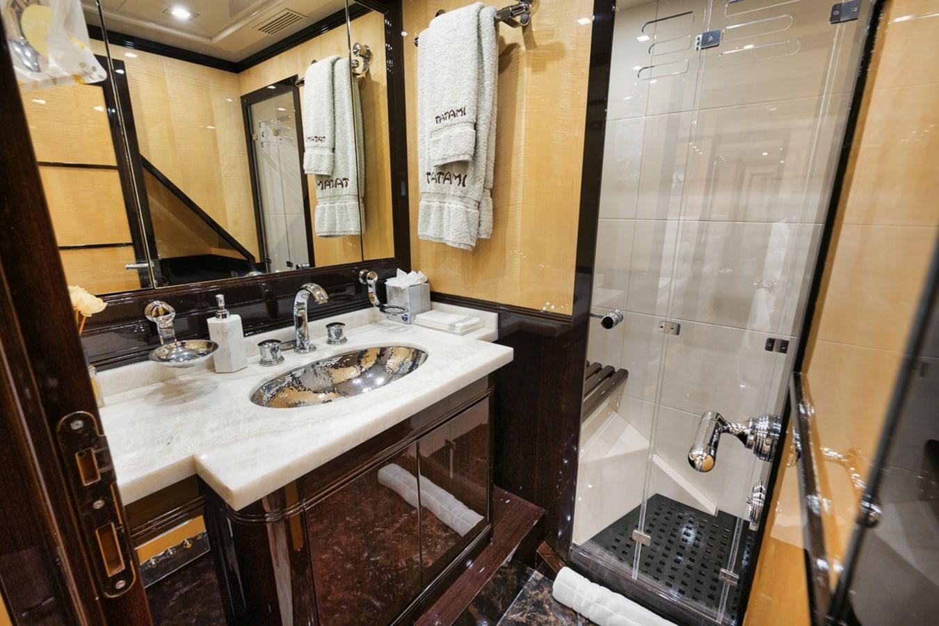 a bathroom with a sink and a shower aboard TATAMI Yacht for Sale