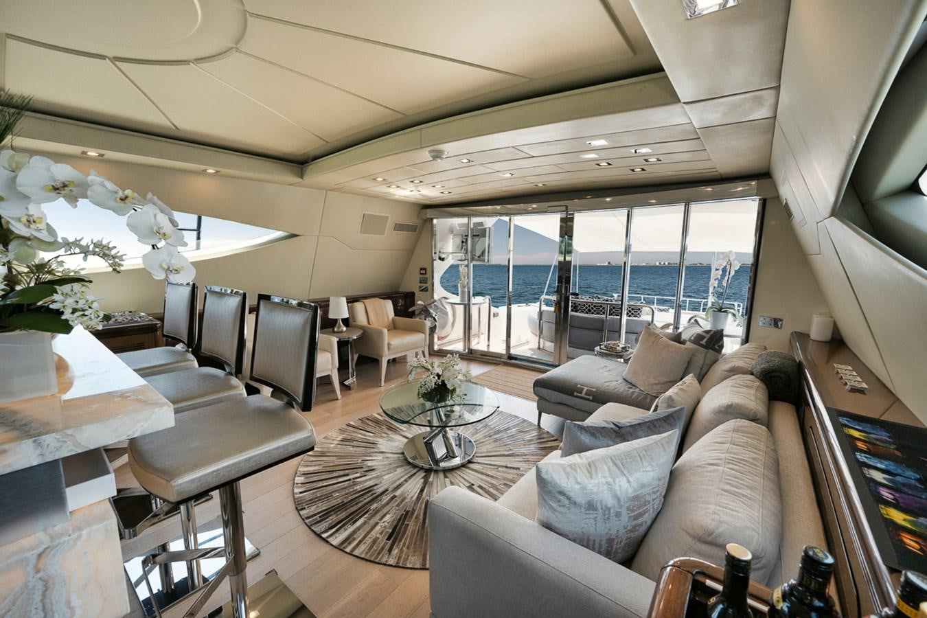 a living room with a large window aboard TATAMI Yacht for Sale