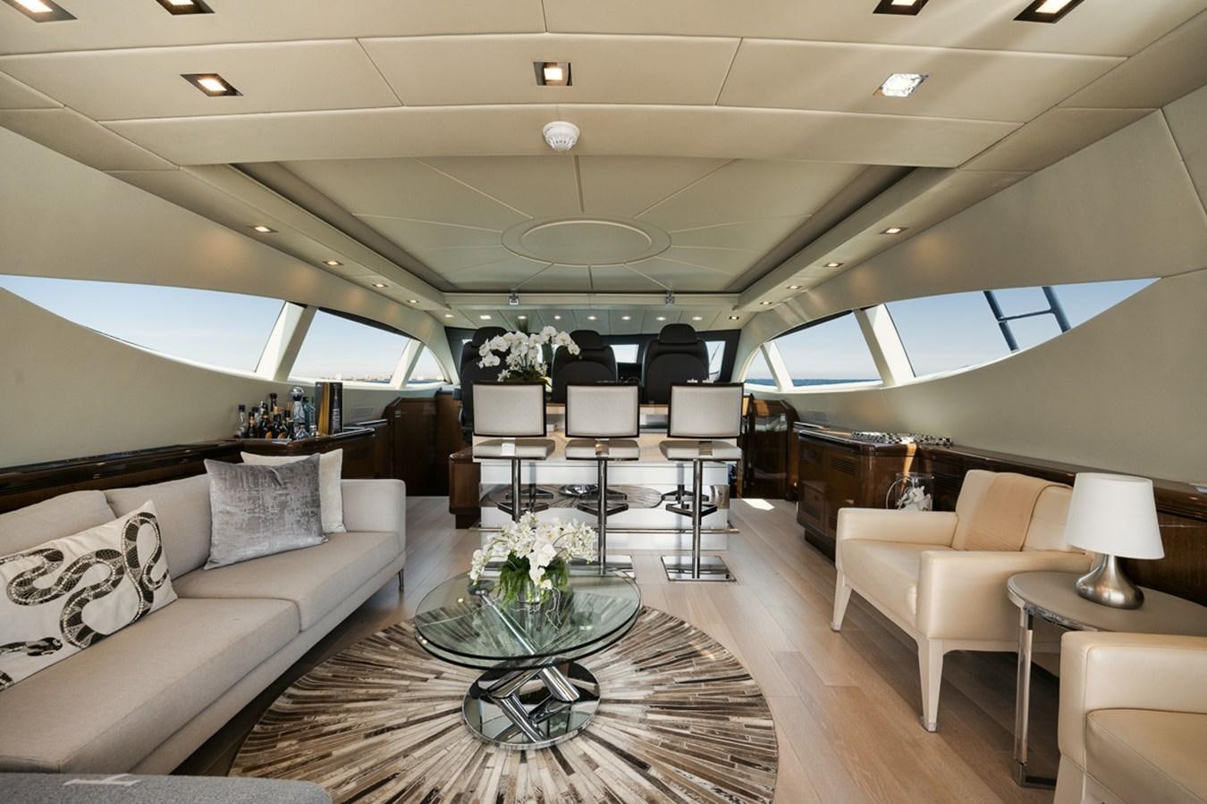 a living room with a large window aboard TATAMI Yacht for Sale