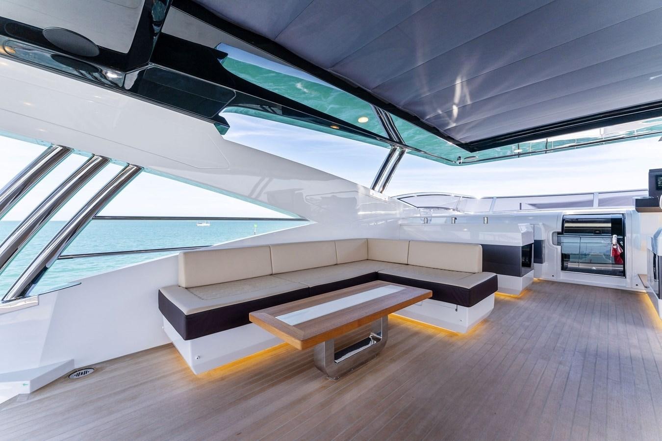 a room with a wood floor and a large window with a view of the outside aboard FOR DISPLAY ONLY Yacht for Sale