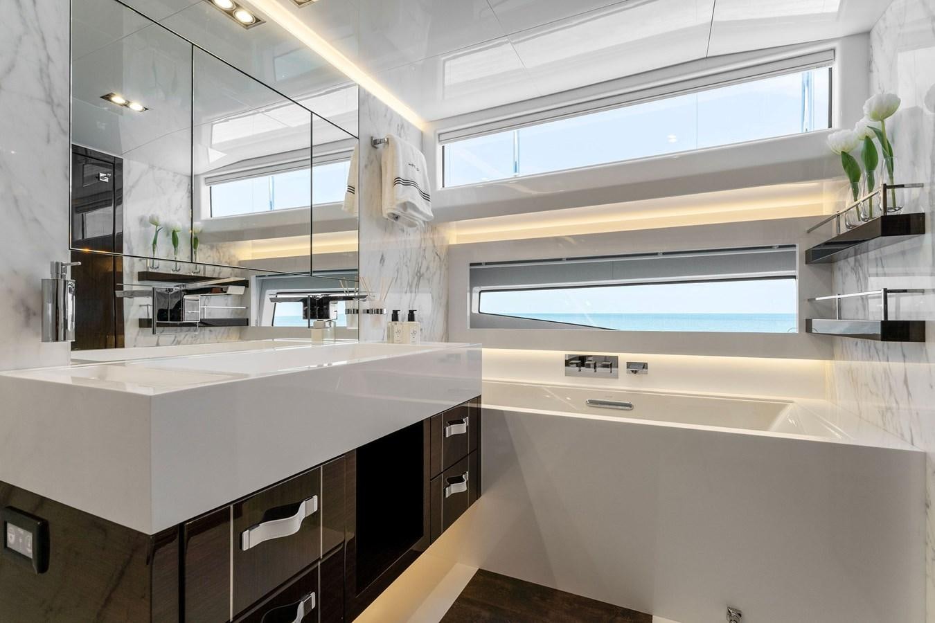a kitchen with white cabinets aboard FOR DISPLAY ONLY Yacht for Sale