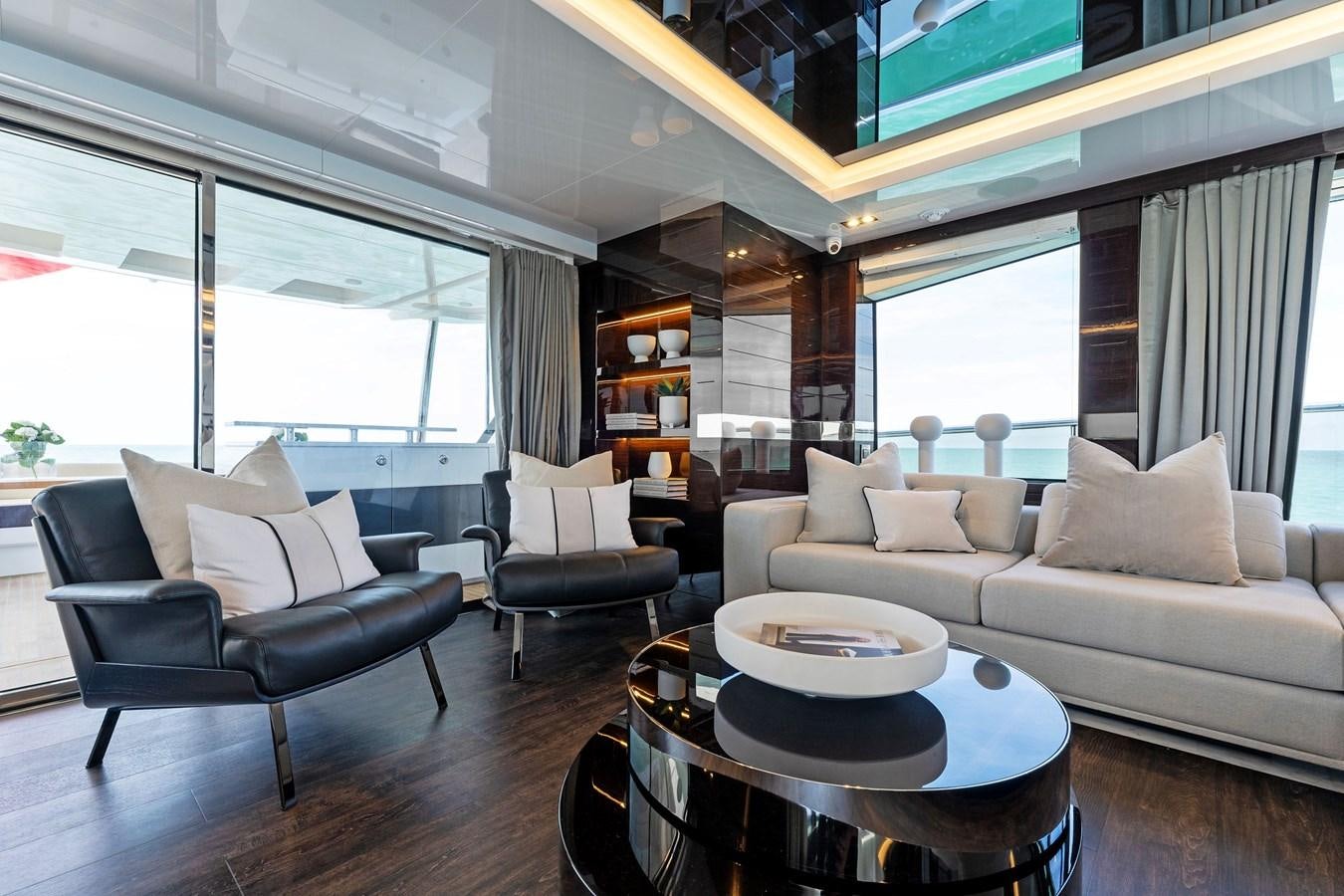a living room with a large window aboard FOR DISPLAY ONLY Yacht for Sale