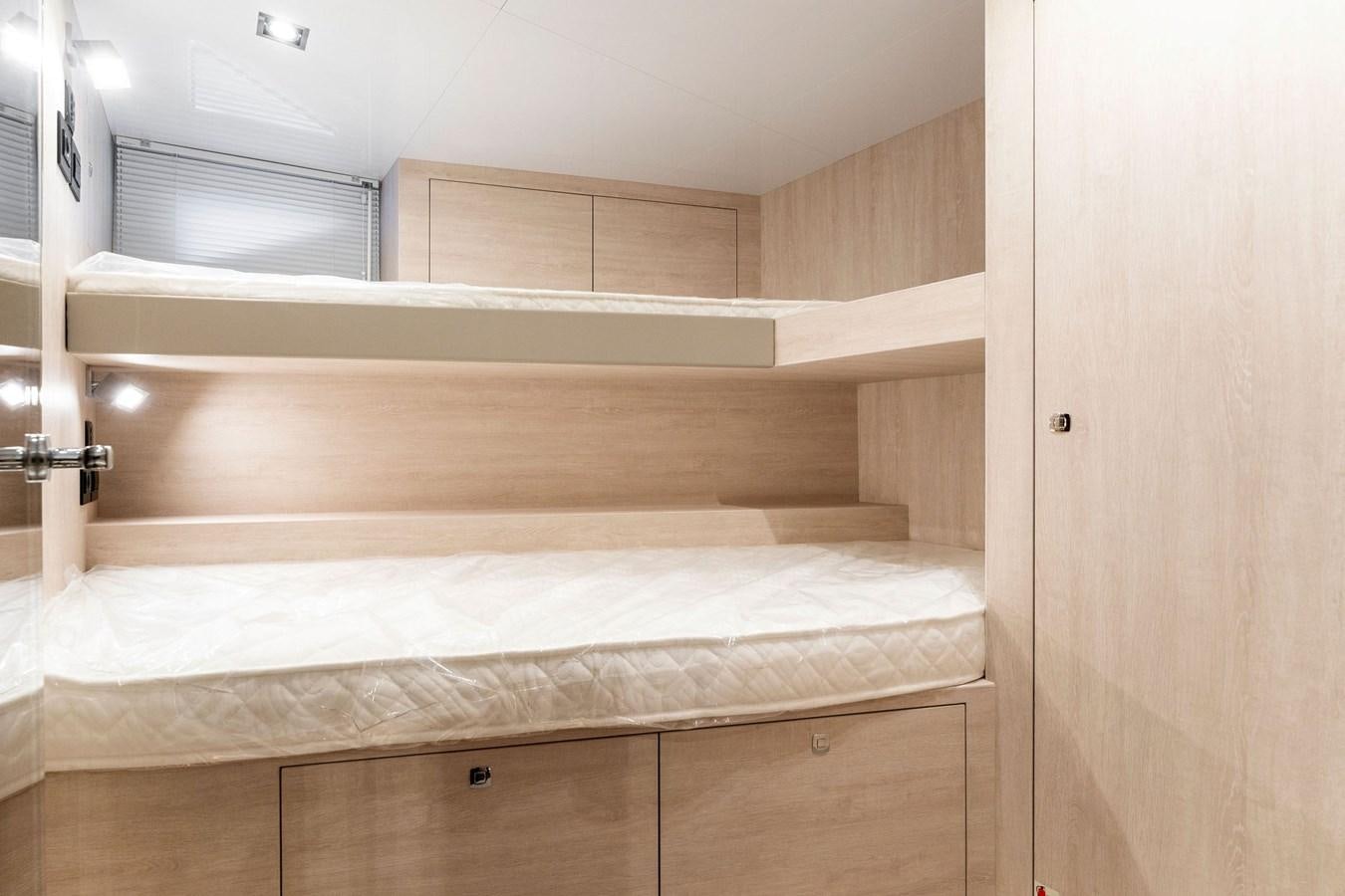 a room with a bed and a closet aboard FOR DISPLAY ONLY Yacht for Sale