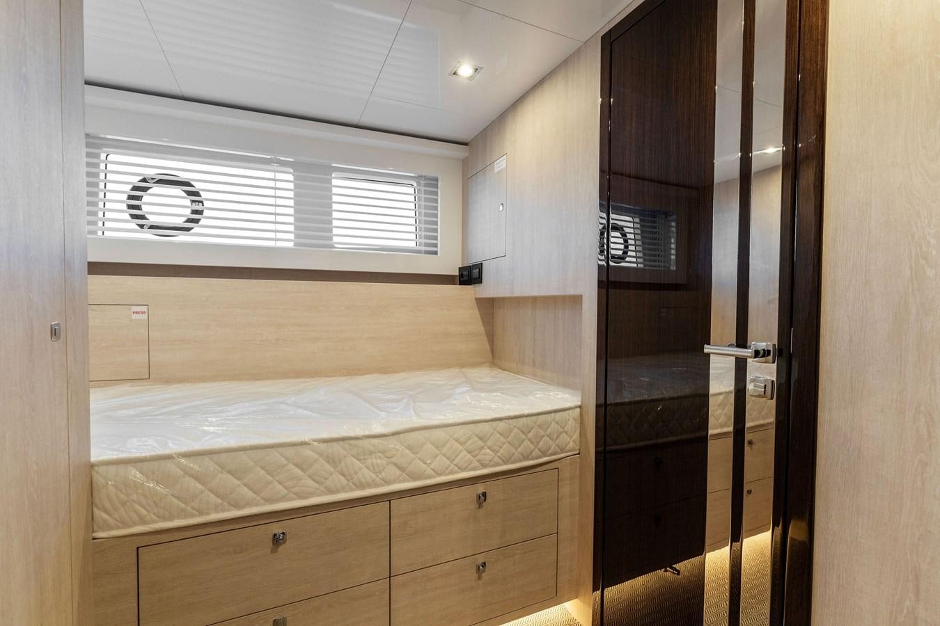 a room with a bed and a closet aboard FOR DISPLAY ONLY Yacht for Sale