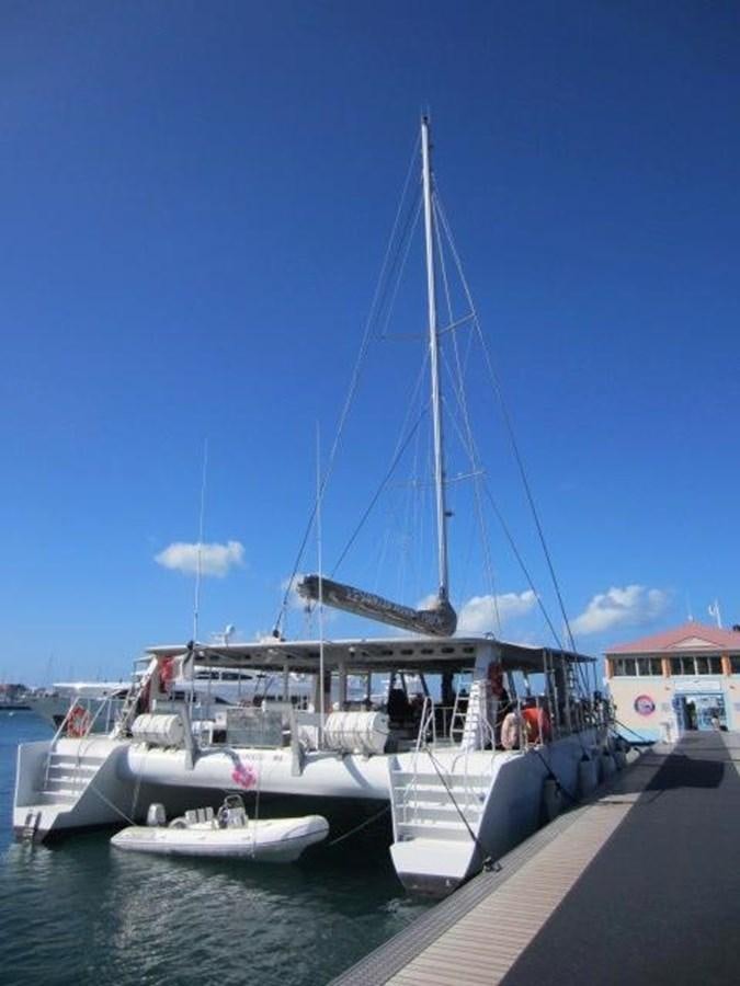 a boat docked at a pier aboard ECOLORATO Yacht for Sale