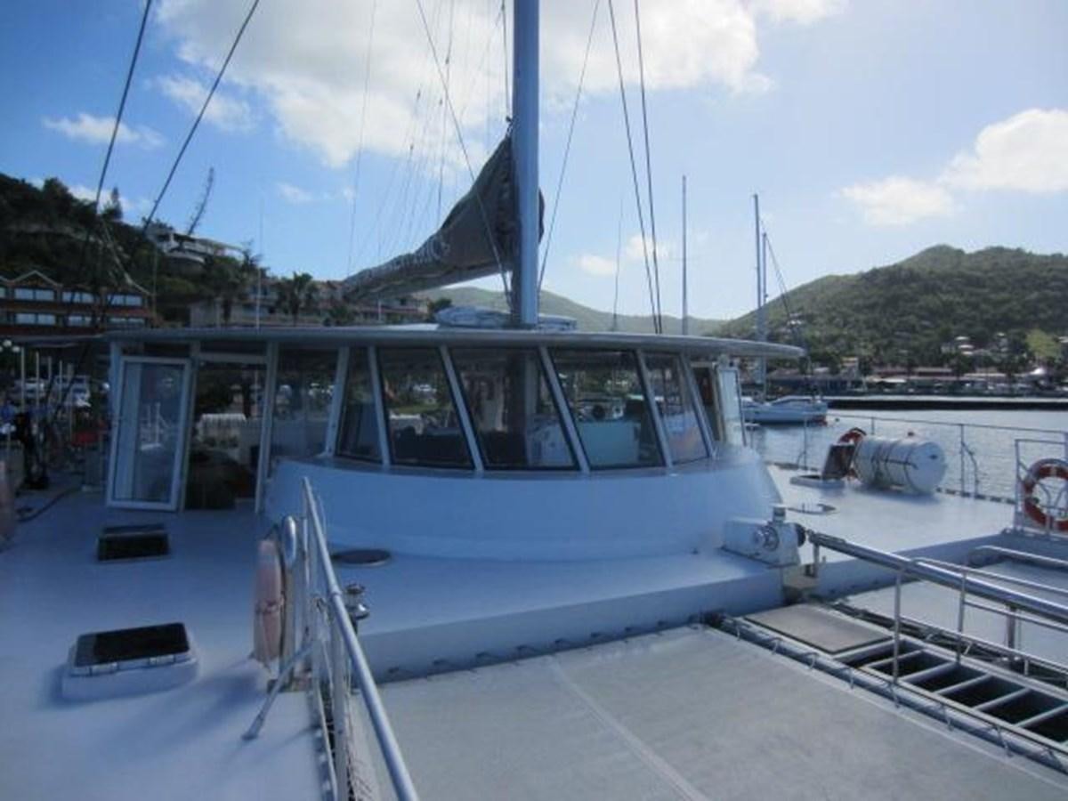 a boat docked at a pier aboard ECOLORATO Yacht for Sale