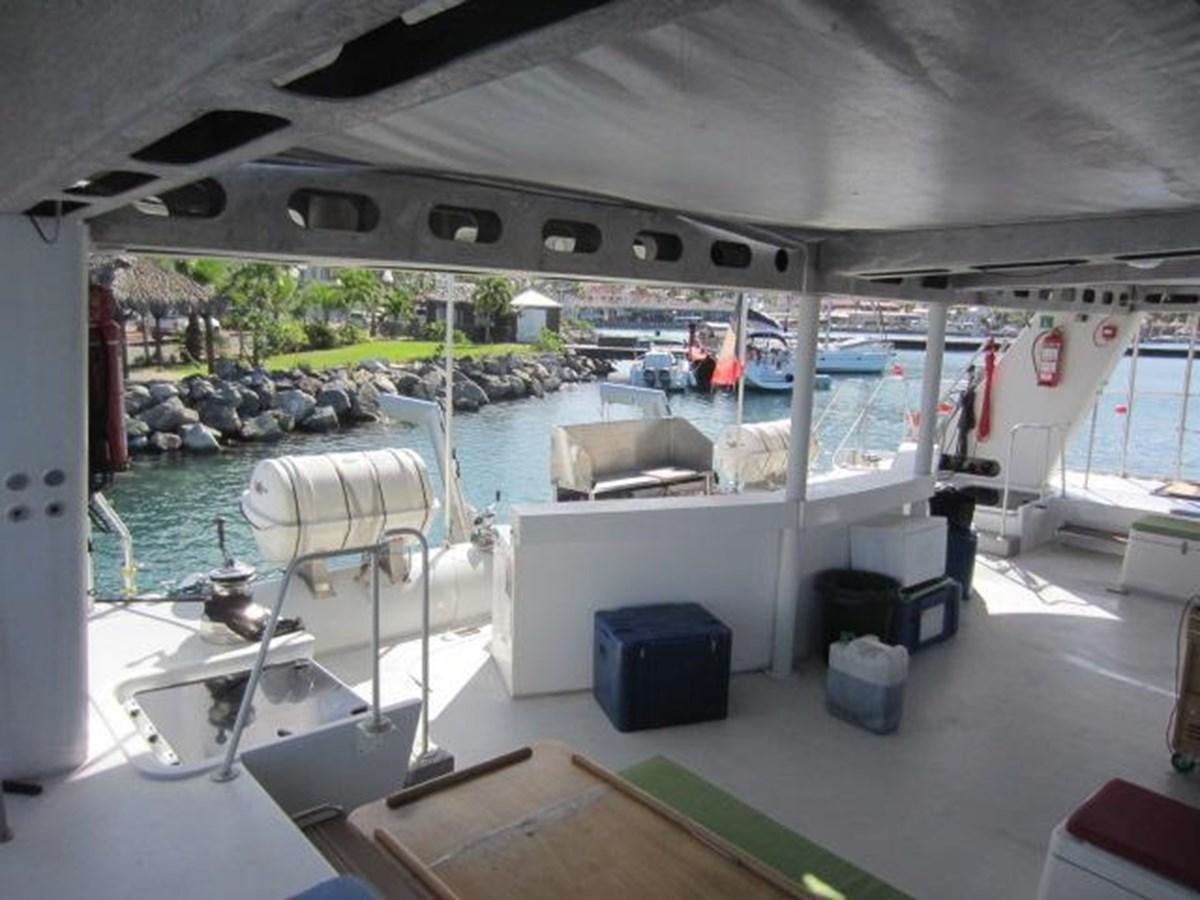 a boat docked in a harbor aboard ECOLORATO Yacht for Sale