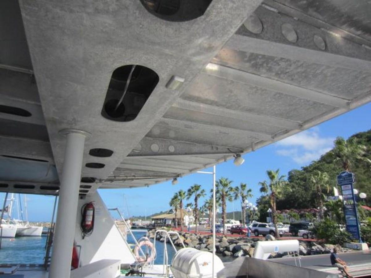 a large white structure with a blue tower and a blue tower aboard ECOLORATO Yacht for Sale