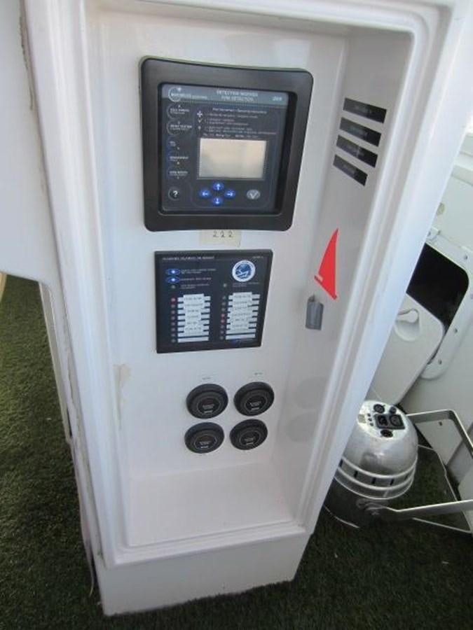 a white machine with buttons and a screen aboard ECOLORATO Yacht for Sale