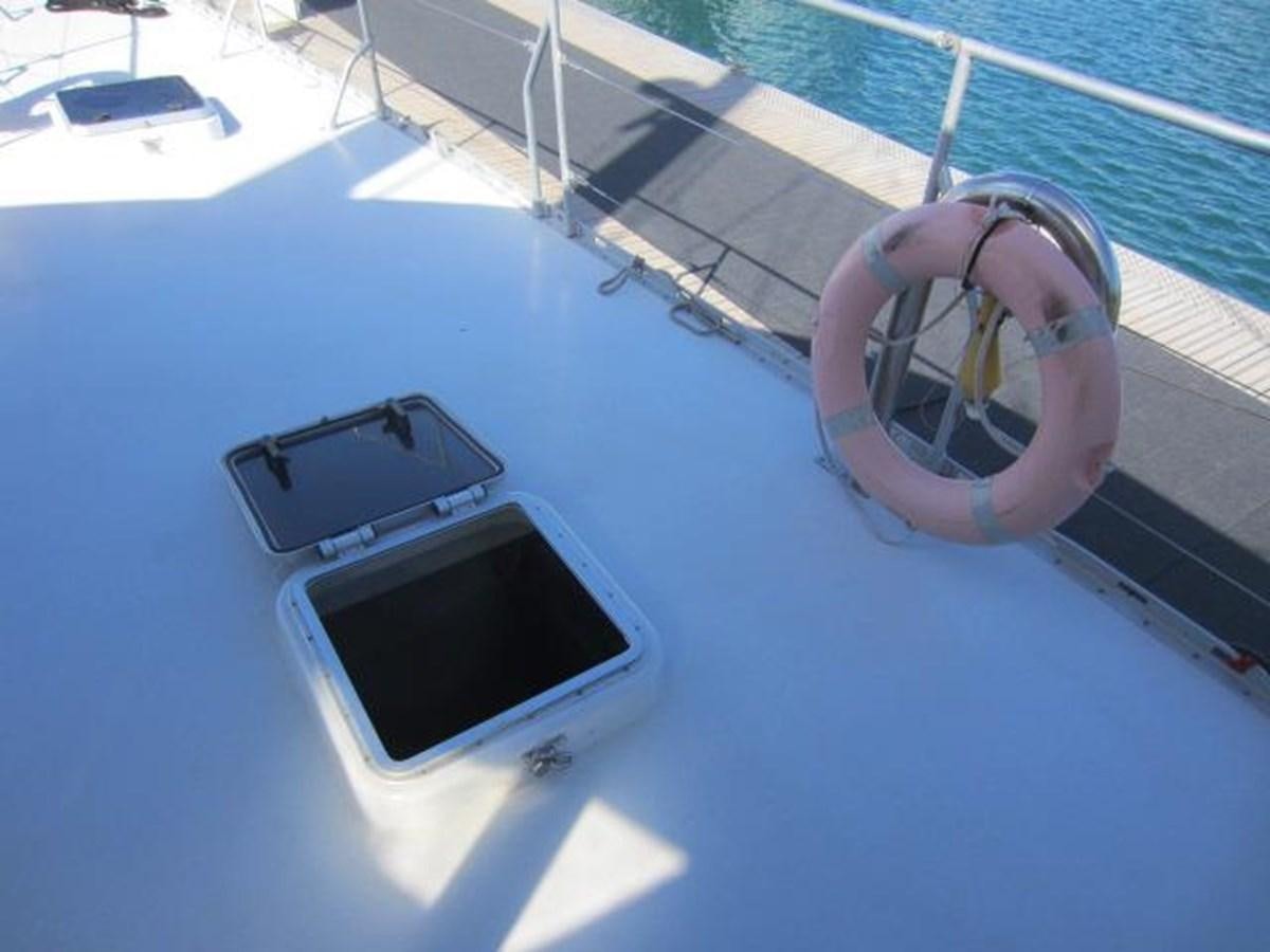 a hand holding a round object aboard ECOLORATO Yacht for Sale