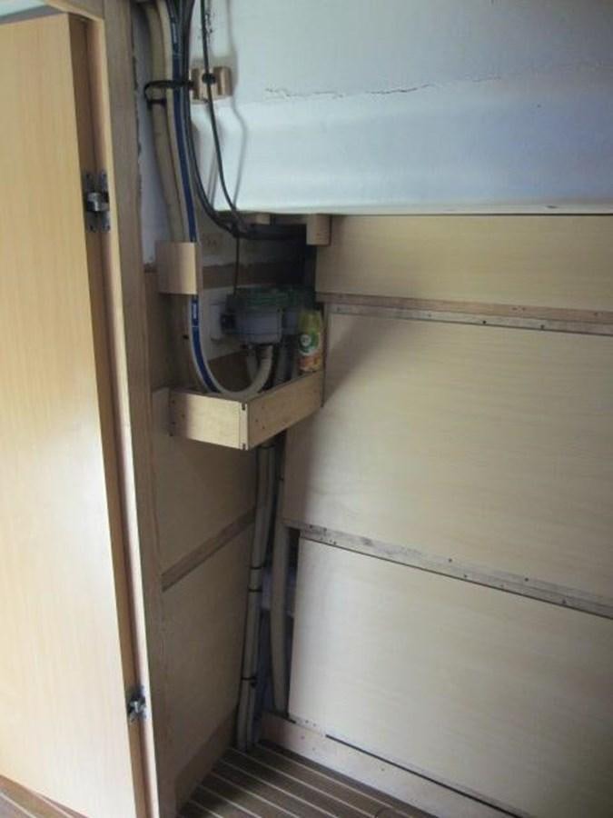 a wall with pipes and wires aboard ECOLORATO Yacht for Sale