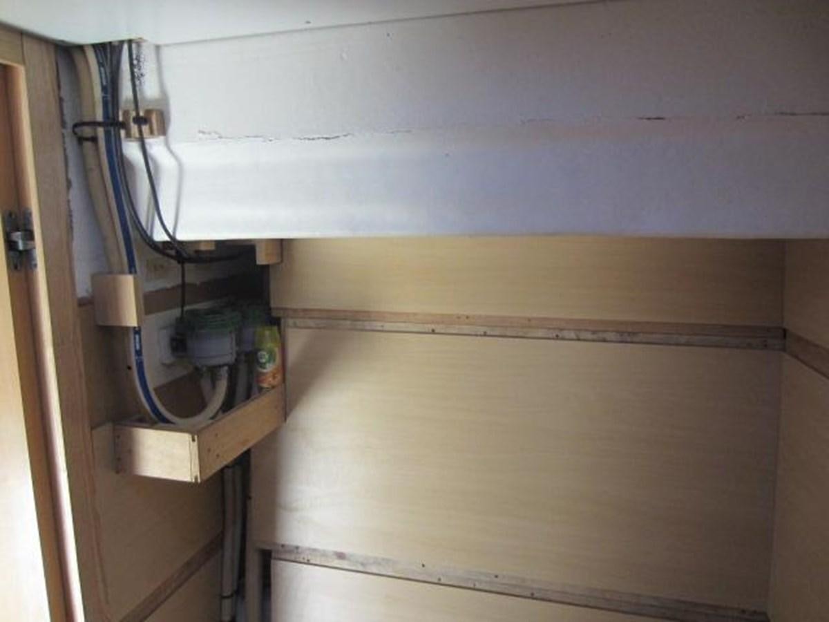 a wall with pipes and wires aboard ECOLORATO Yacht for Sale