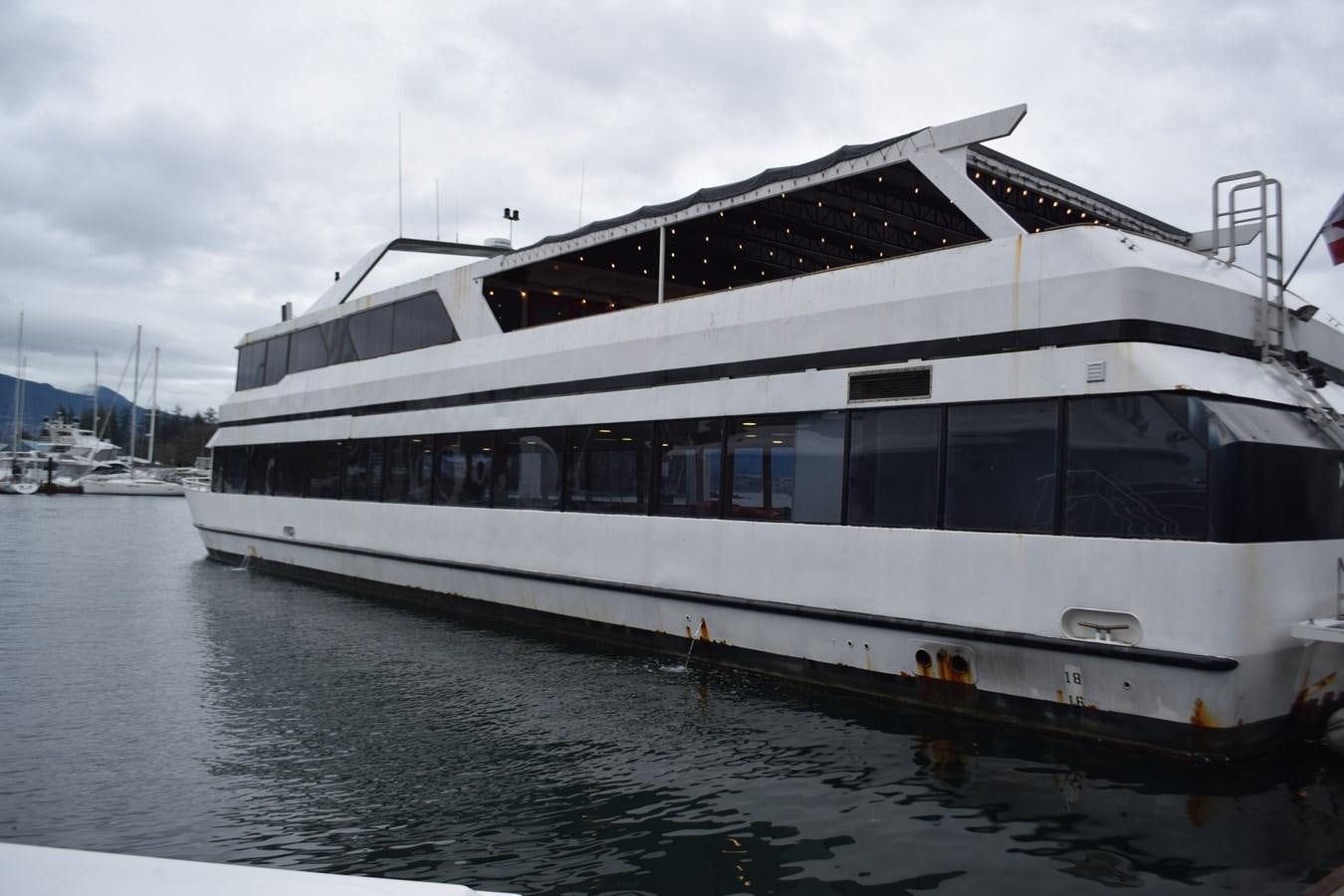 a large white yacht aboard MAGIC CHARM Yacht for Sale