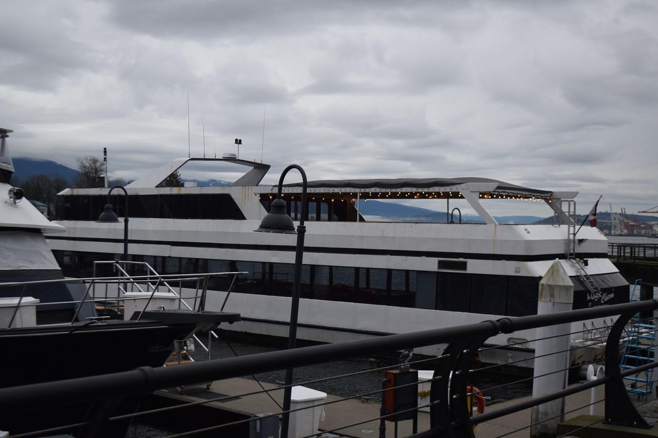 a large white yacht aboard MAGIC CHARM Yacht for Sale