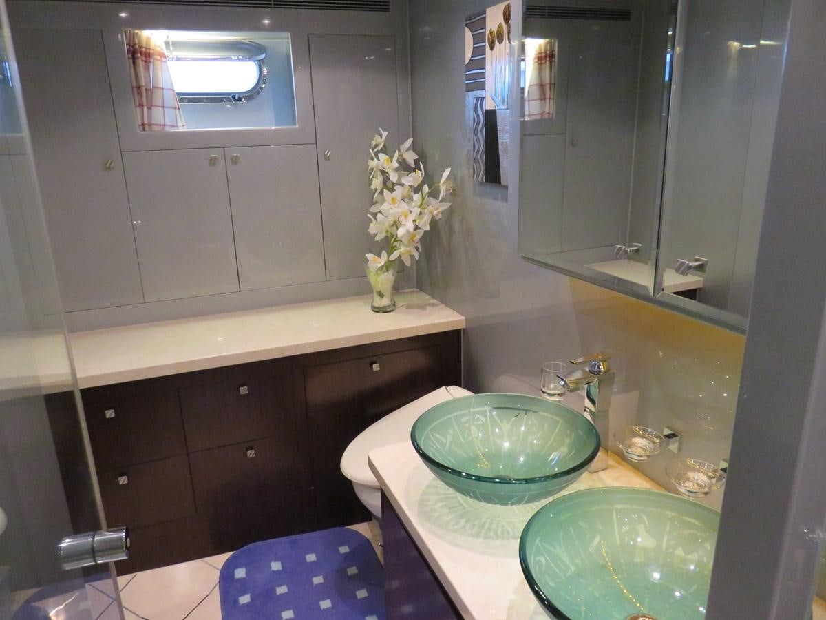 a bathroom with a sink and a mirror aboard ANA Yacht for Sale
