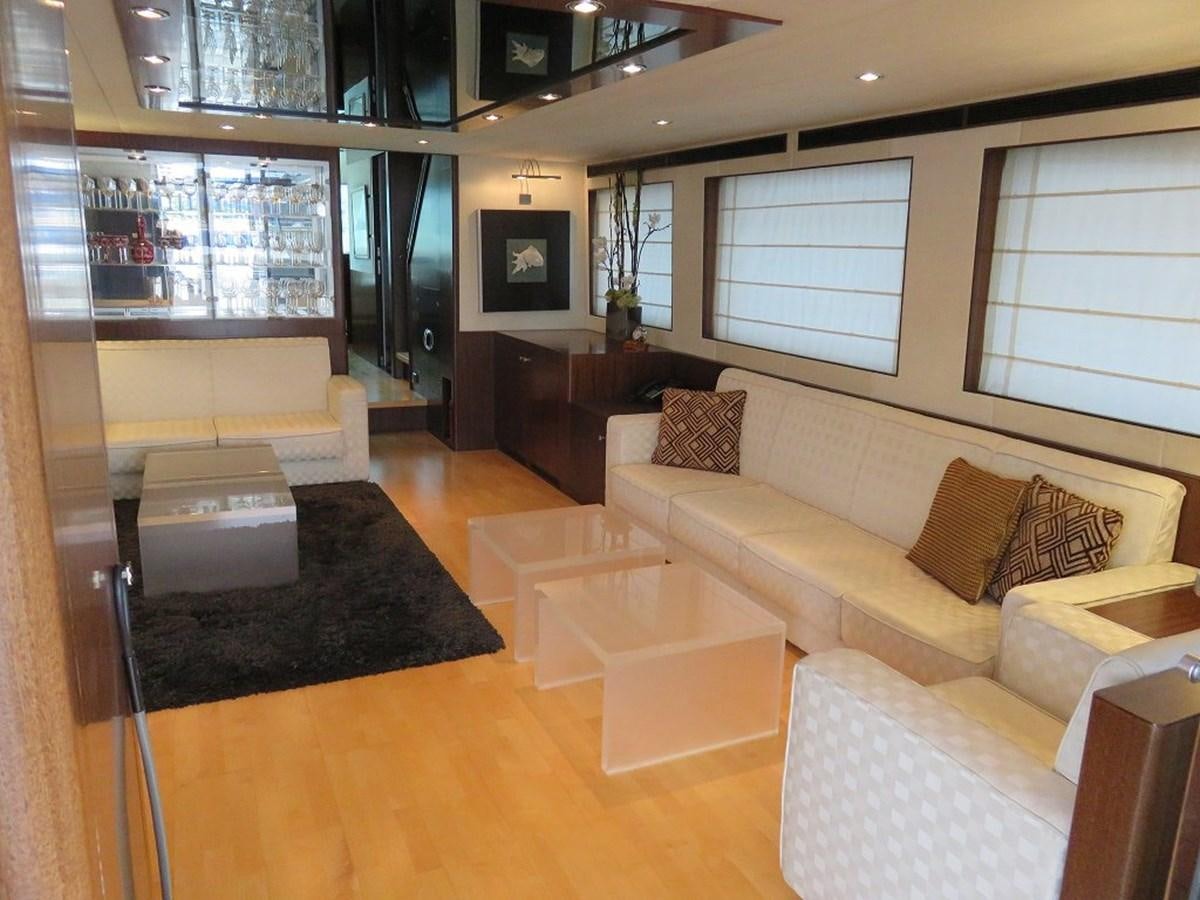 a living room with a large window aboard ANA Yacht for Sale