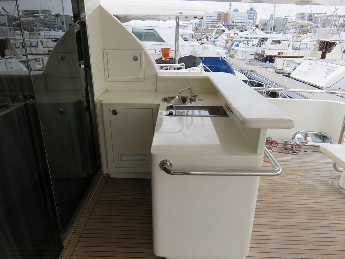 a boat in a harbor aboard ANA Yacht for Sale