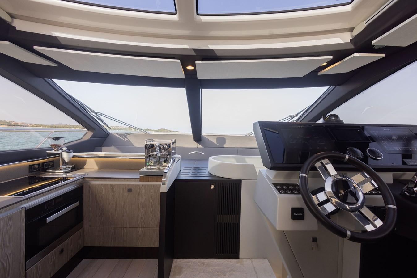 inside of a car aboard ESCAPE Yacht for Sale