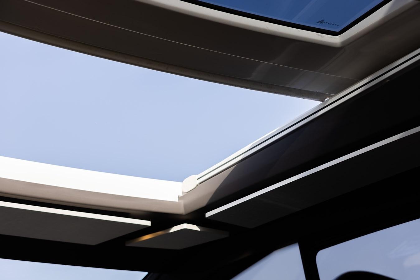 a close-up of a white and black striped ceiling aboard ESCAPE Yacht for Sale
