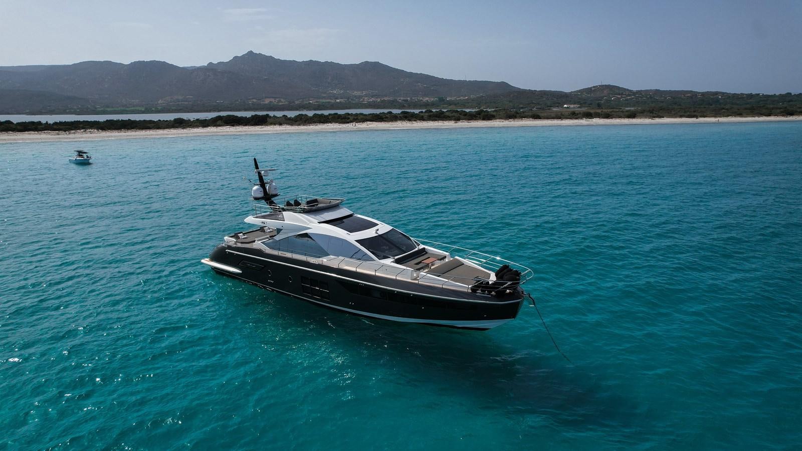 a boat in the water aboard ESCAPE Yacht for Sale