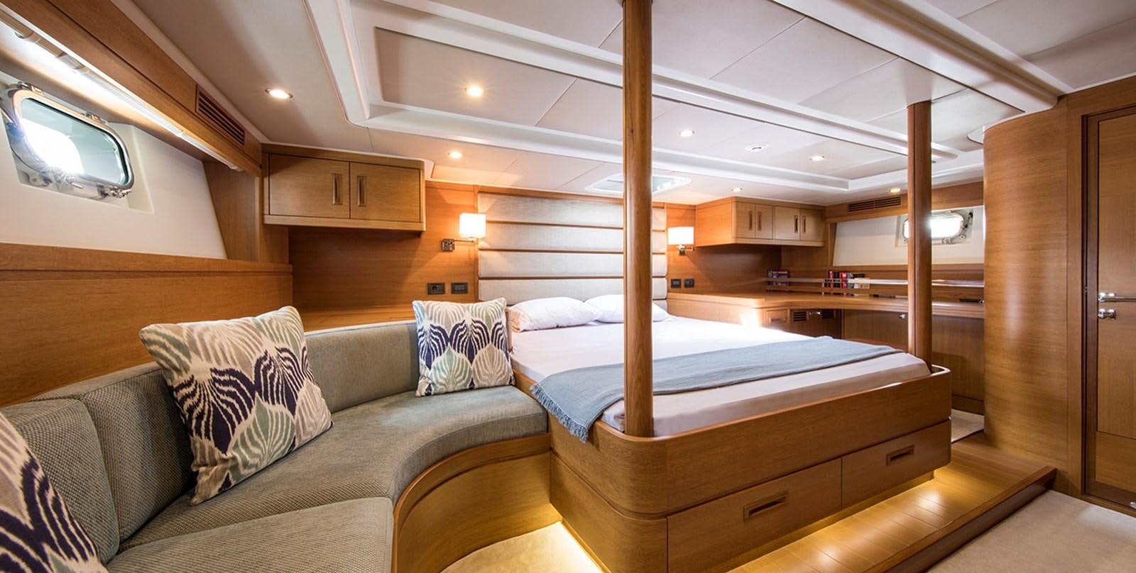 a bed in a room aboard VAYU Yacht for Sale