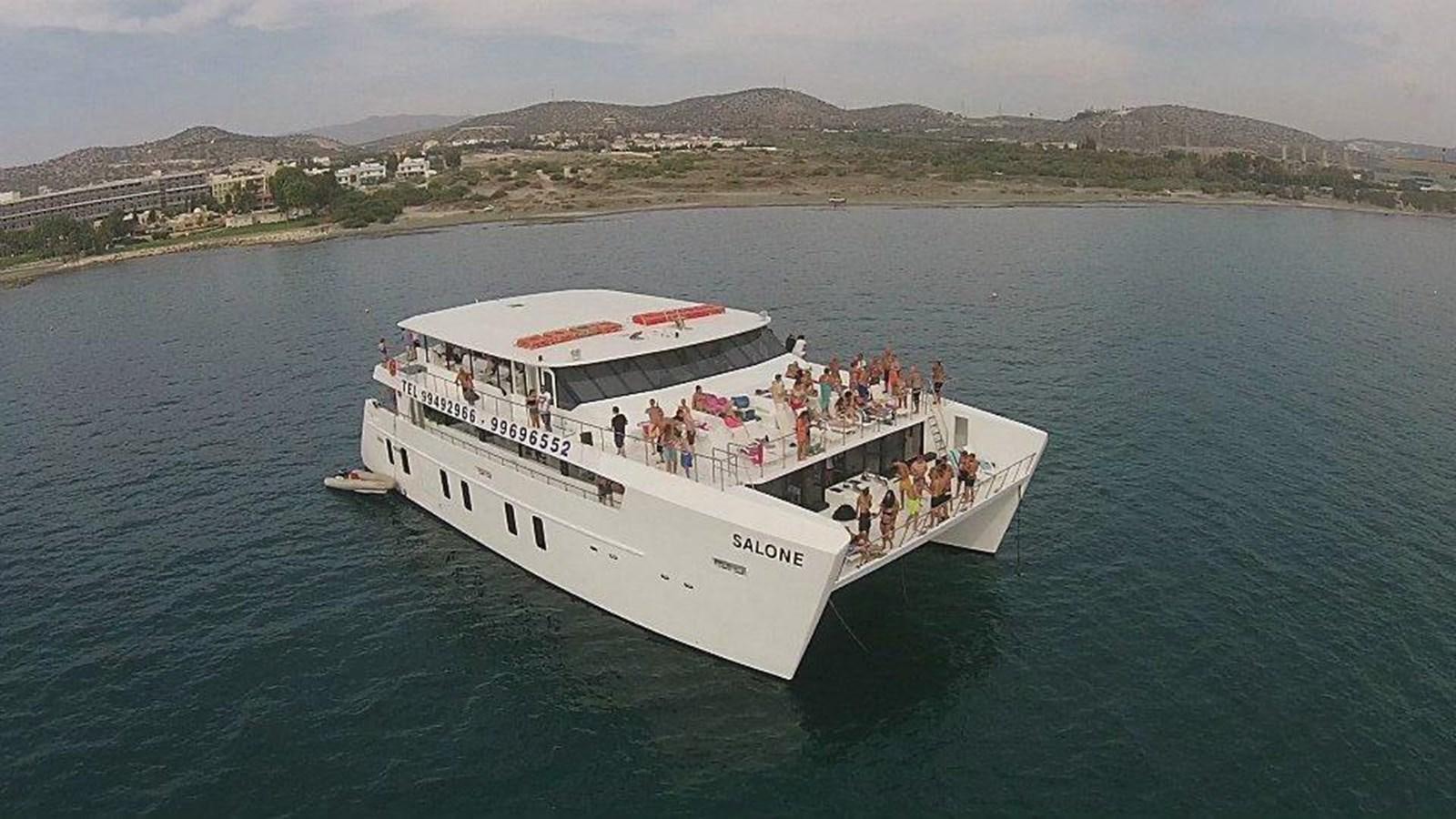 a group of people on a boat aboard SALONE Yacht for Sale