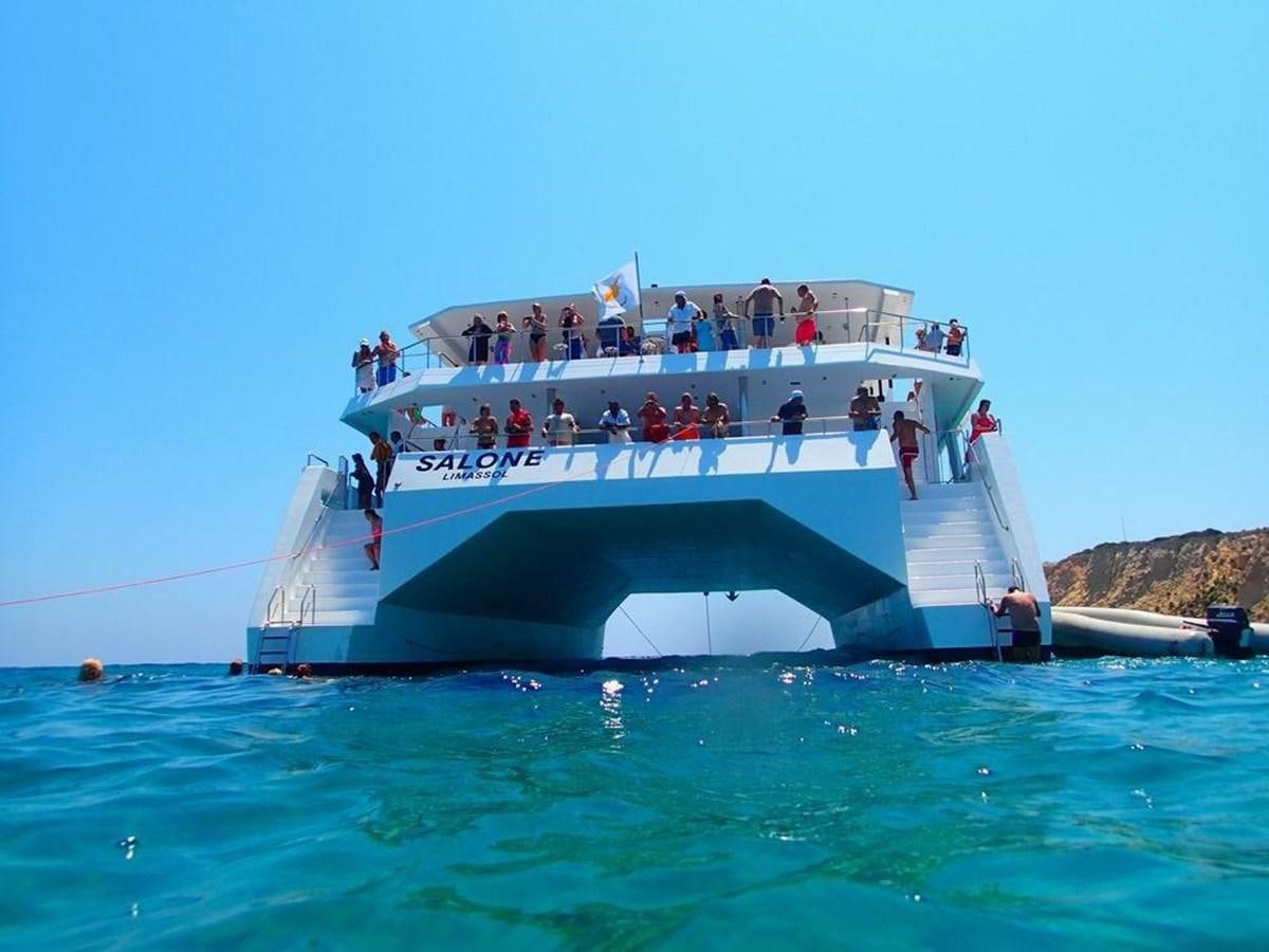 a group of people on a boat aboard SALONE Yacht for Sale