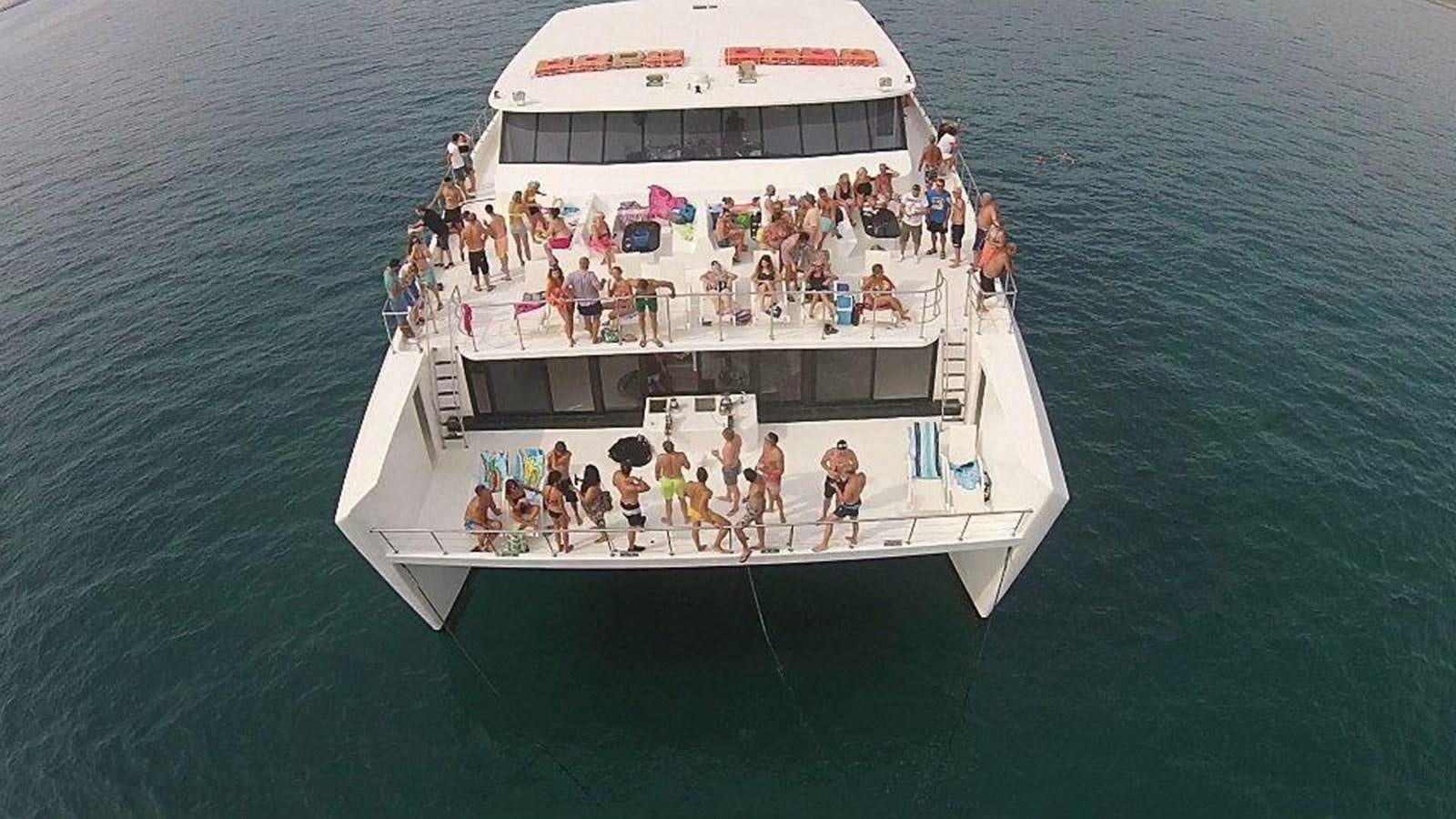a group of people on a boat aboard SALONE Yacht for Sale