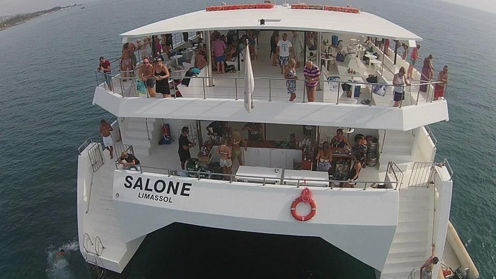 a group of people on a boat aboard SALONE Yacht for Sale